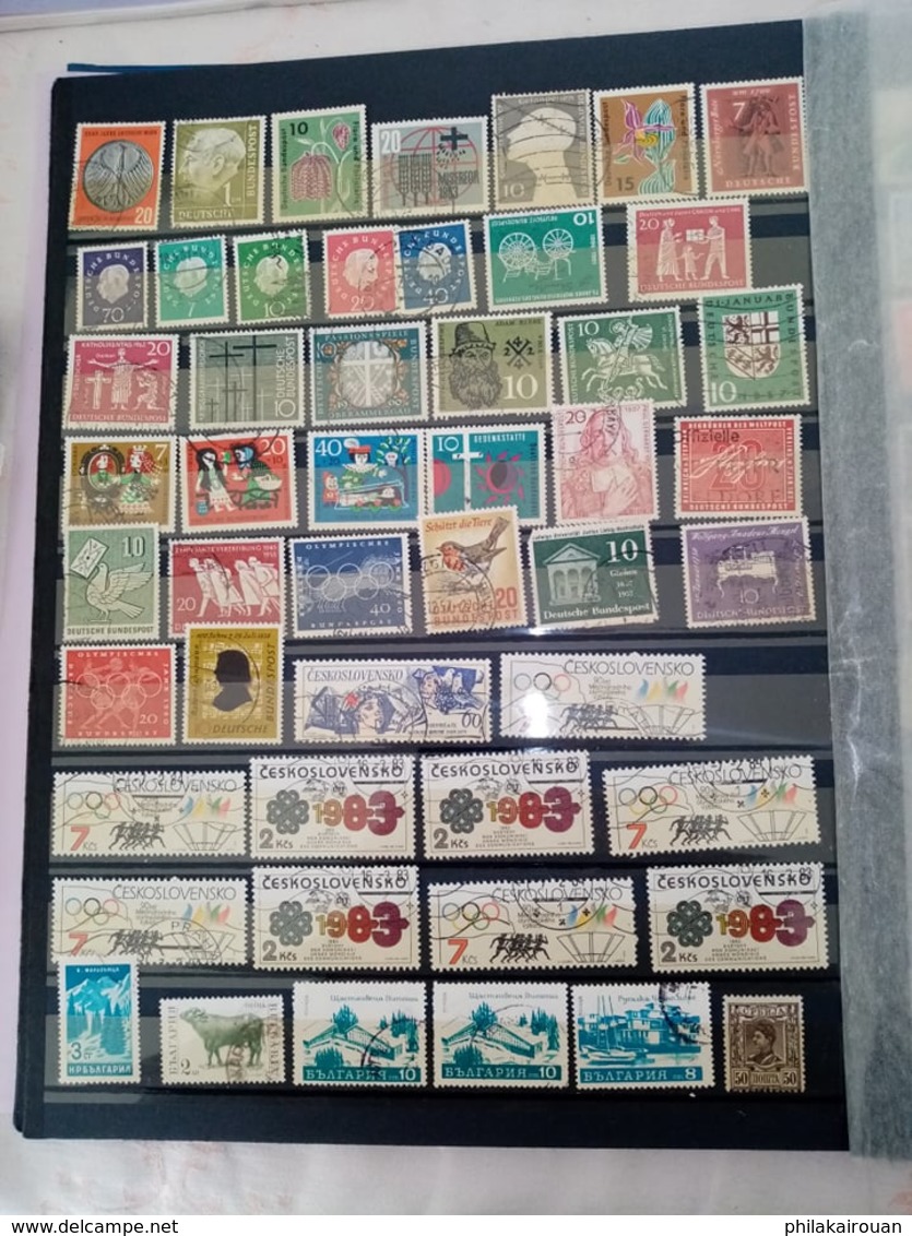 Lot numero 4 lot de 1000 timbres divers pays dont pays bas japon DDR allemagne et autres