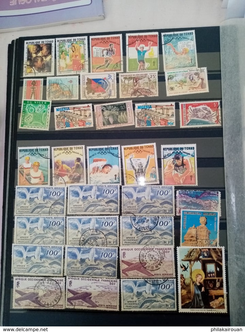 Lot numero 4 lot de 1000 timbres divers pays dont pays bas japon DDR allemagne et autres