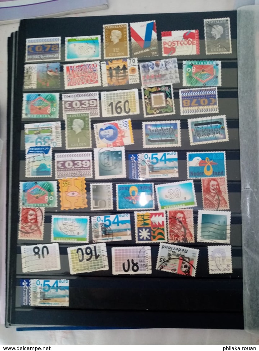 Lot numero 4 lot de 1000 timbres divers pays dont pays bas japon DDR allemagne et autres