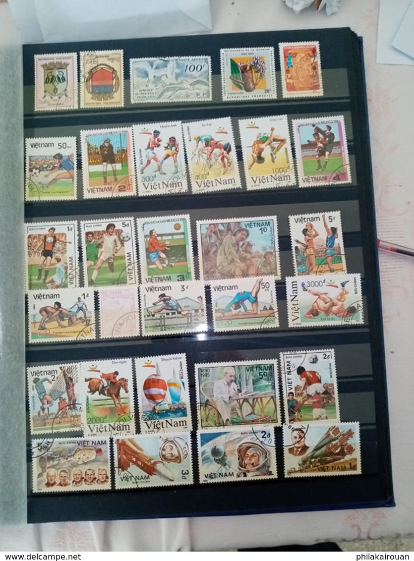 Lot numero 4 lot de 1000 timbres divers pays dont pays bas japon DDR allemagne et autres