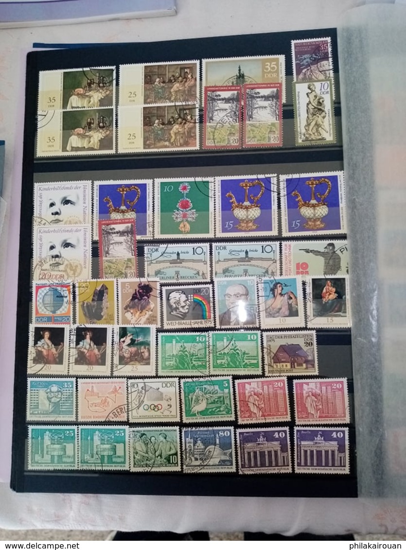 Lot numero 4 lot de 1000 timbres divers pays dont pays bas japon DDR allemagne et autres