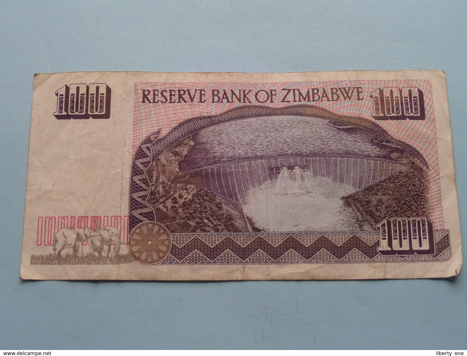 100 - ONE HUNDRED DOLLARS ( FF3821325 ) Reserve Bank Of Zimbabwe ( For Grade, Please See Photo ) ! - Simbabwe