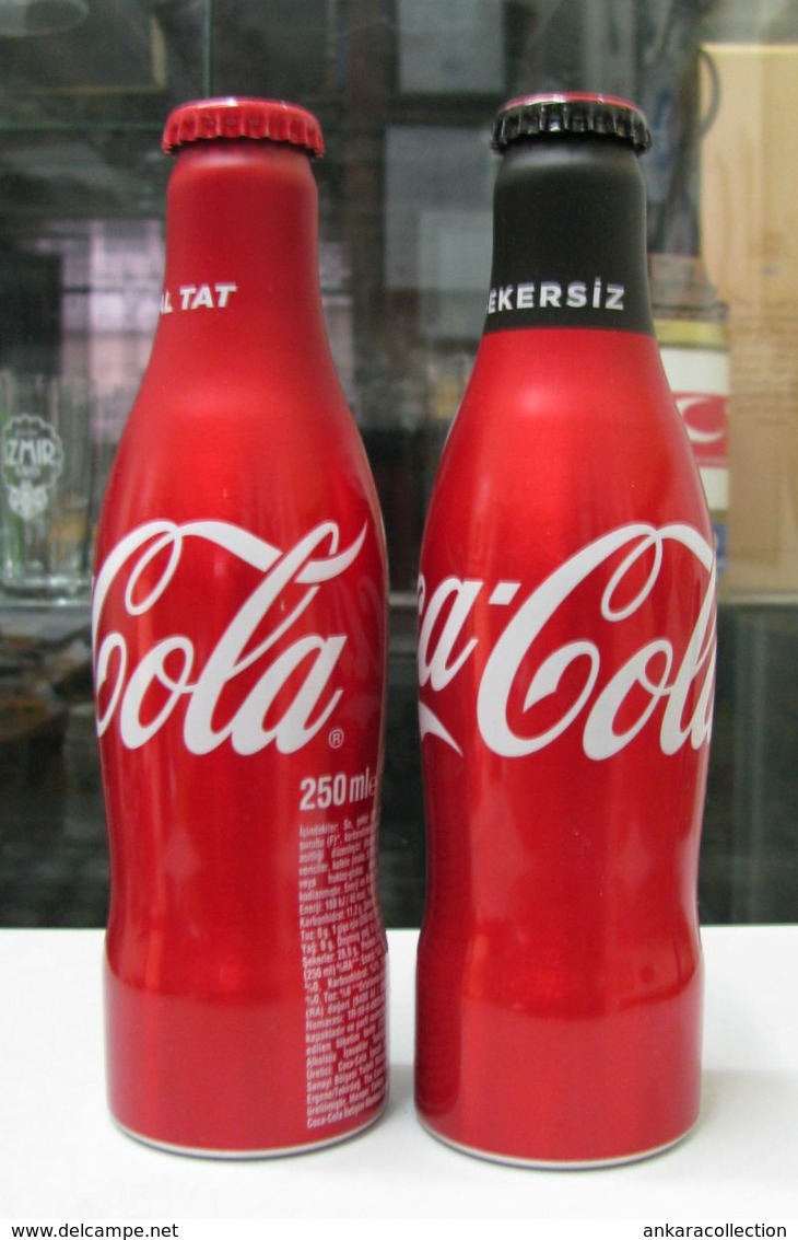 AC - COCA COLA ORIGINAL & SUGARLESS TASTE 2019  ALUMINUM EMPTY BOTTLES & CROWN CAPS - Botellas