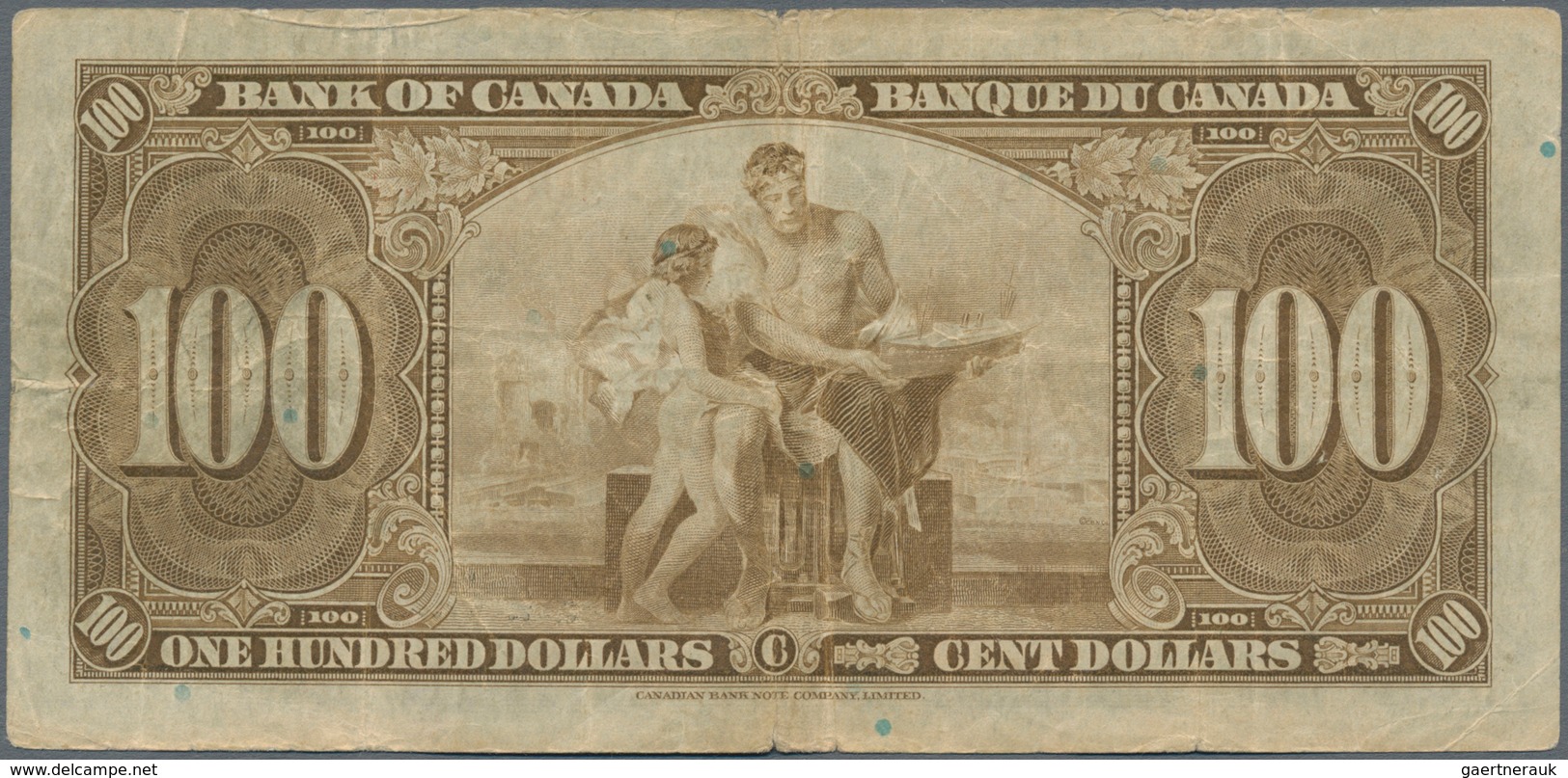 Canada: 100 Dollars 1937, P.64b, Small Margin Split, Some Folds And Lightly Toned Paper. Condition: - Canada