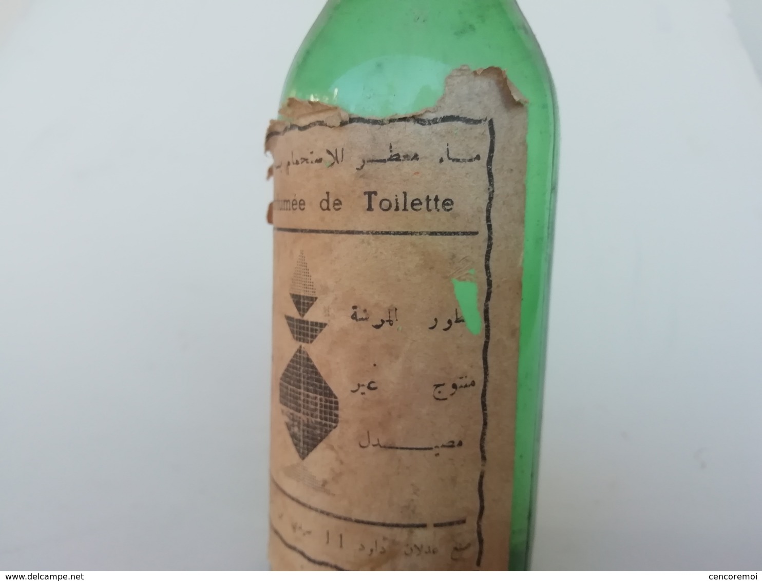 flacon de parfum ancien en forme de canette de bière