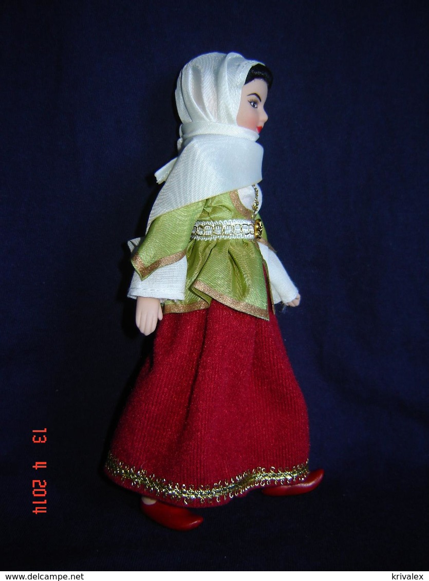 Porcelain doll in cloth dress -Azerbaydzhan Republic -