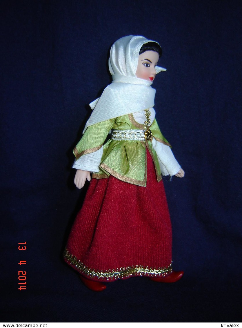 Porcelain doll in cloth dress -Azerbaydzhan Republic -