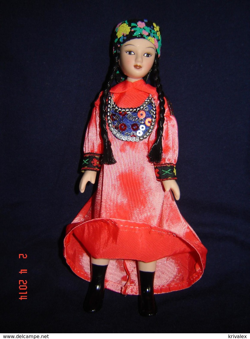 Porcelain doll in cloth dress - Khakasia Republic  province  - Russian Federation