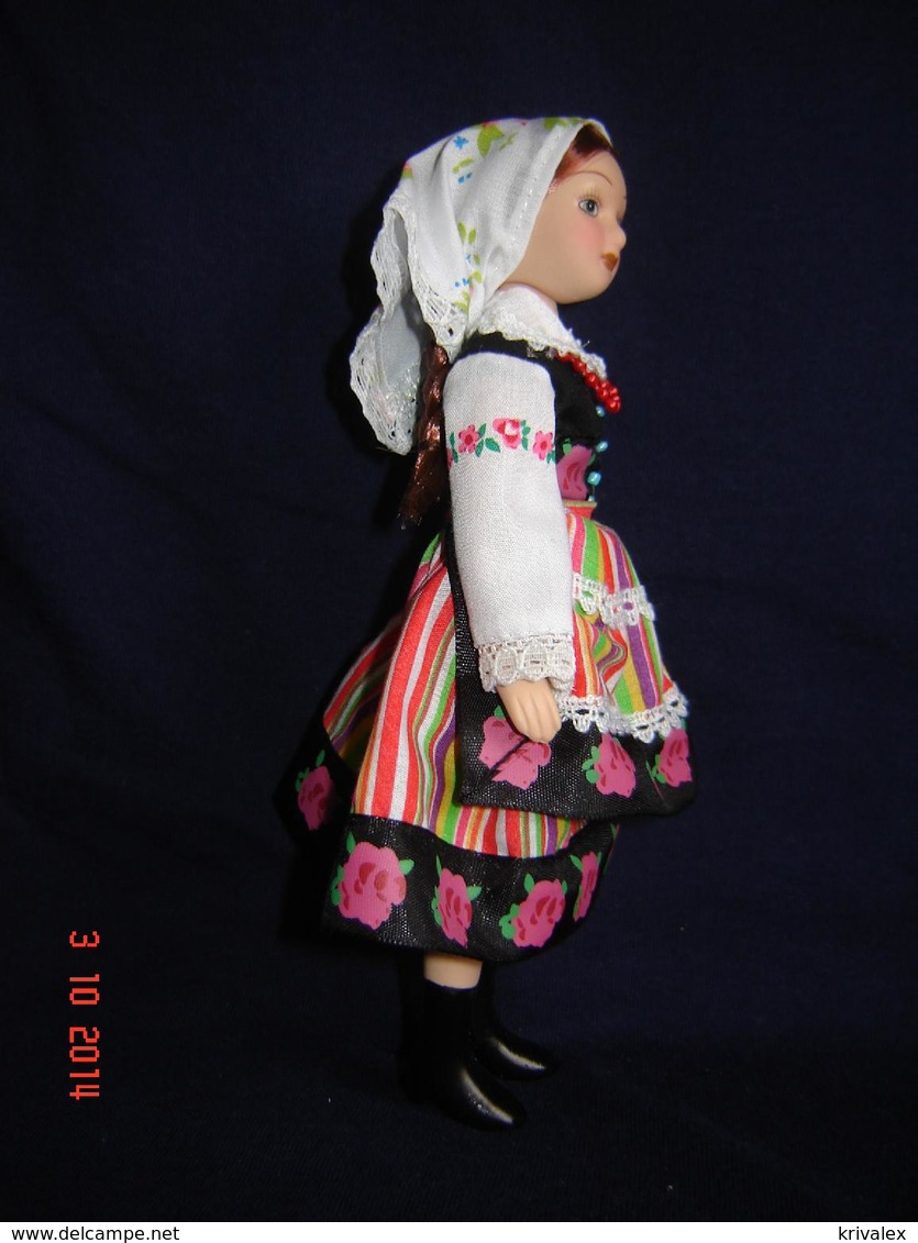 Porcelain doll in cloth dress -Poland   Republic -