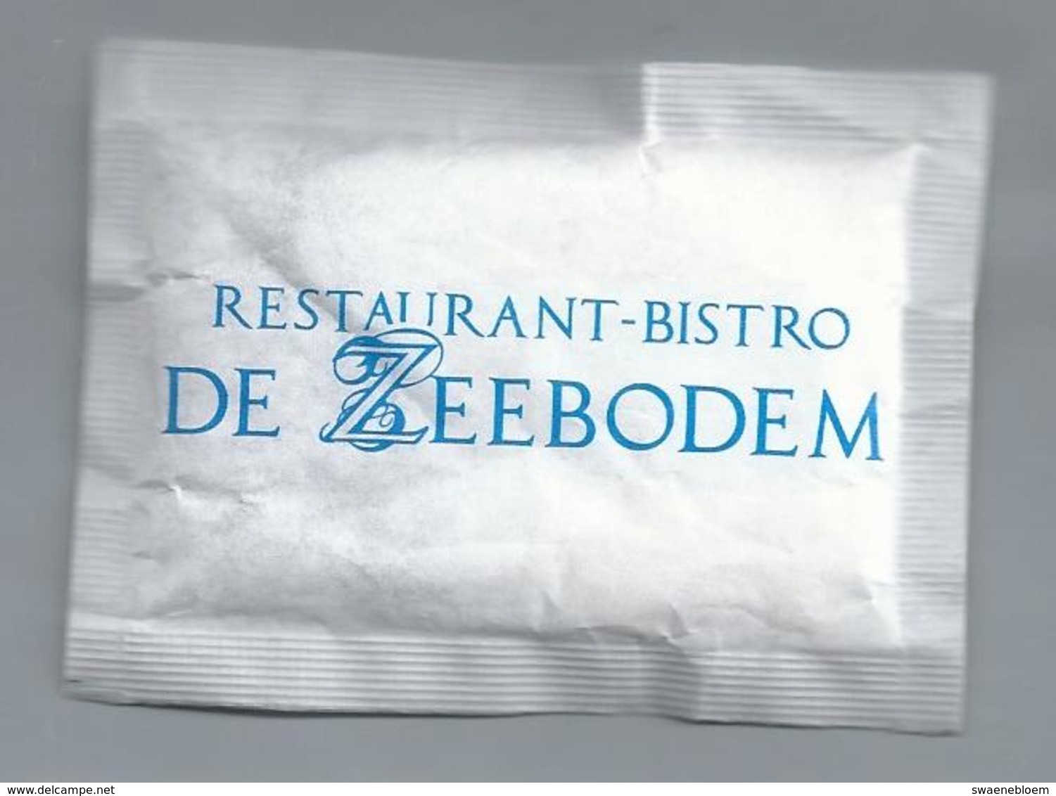 Suikerzakje.- URK. RESTAURANT BISTRO - DE ZEEBODEM -. Suiker Sucre Zucchero Zucker Sugar - Suiker