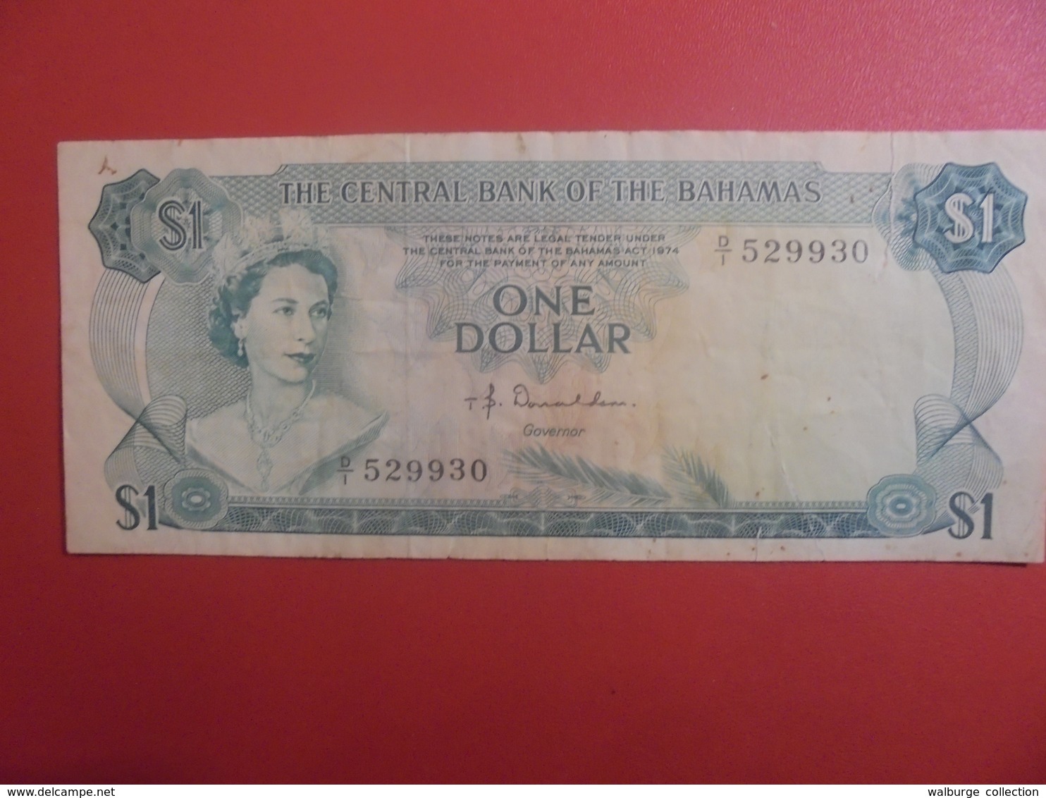 BAHAMAS 1$ 1974 CIRCULER +PETITE REPARATION  (B.11) - Bahamas