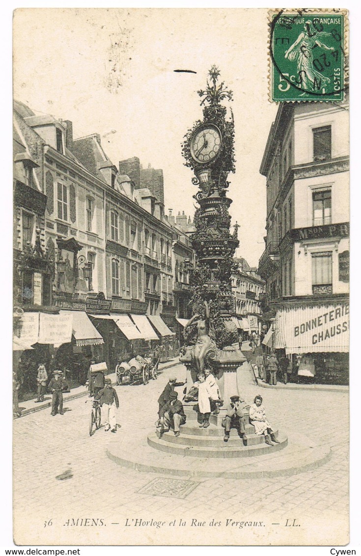 36 Amiens - L’Horloge Et La Rue Des Vergeaux - LL - Animée - Charrette - Vélo - Bonneterie - Mr AUGUEZ - Circulé 1907 - Amiens