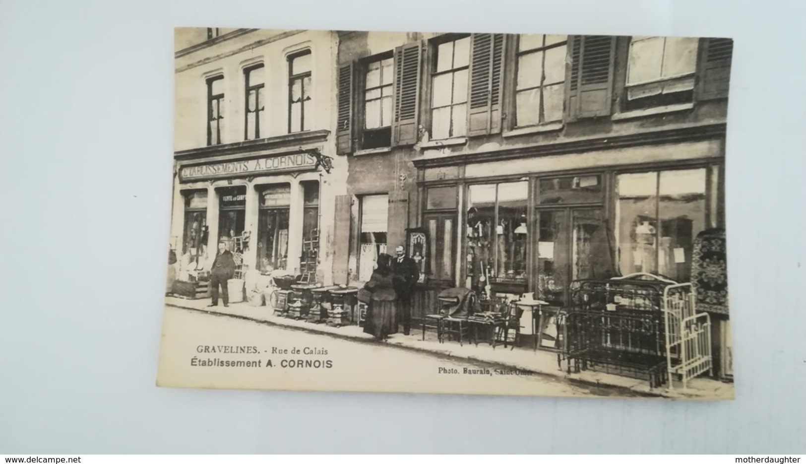 CPA ANIMEE NON CIRCULEE - GRAVELINES - RUE DE CALAIS - ETABLISSEMENT A.CORNOIS - PHOTO BAURAIN SAINT OMER - Gravelines