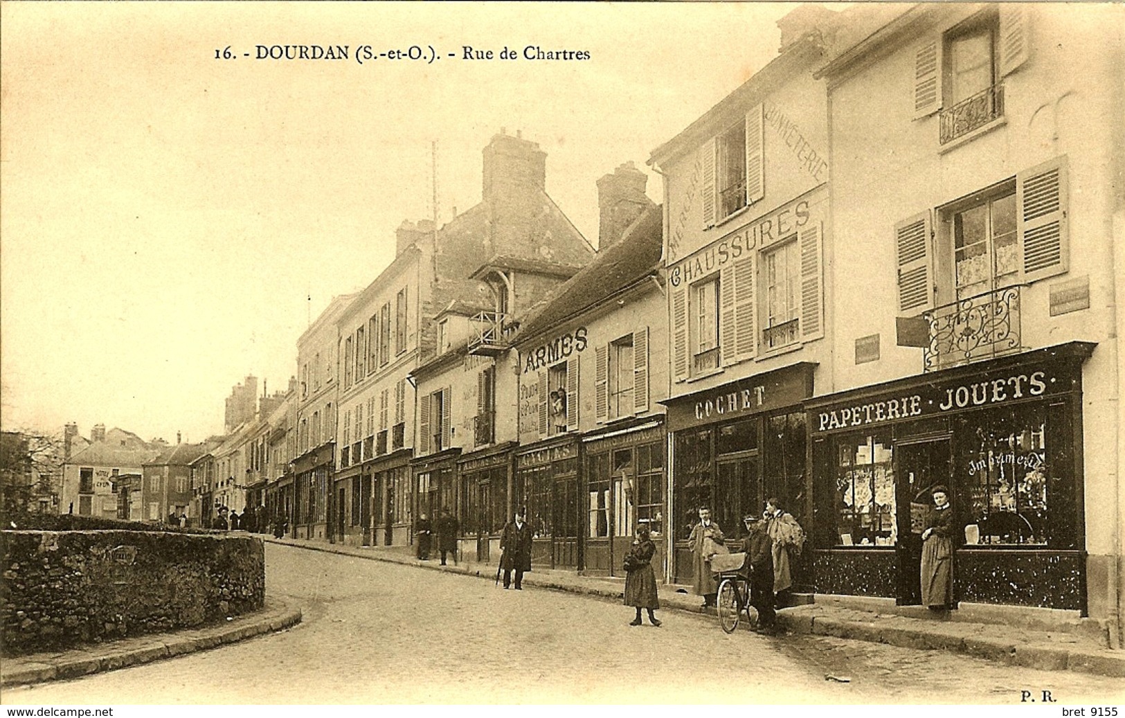 91 DOURDAN LES COMMERCES RUE CHARTRES CHAUSSURES COCHET PAPETERIE IMPRIMERIE JOUETS ARMES BOULANGERIE HOTEL DE LYON - Dourdan