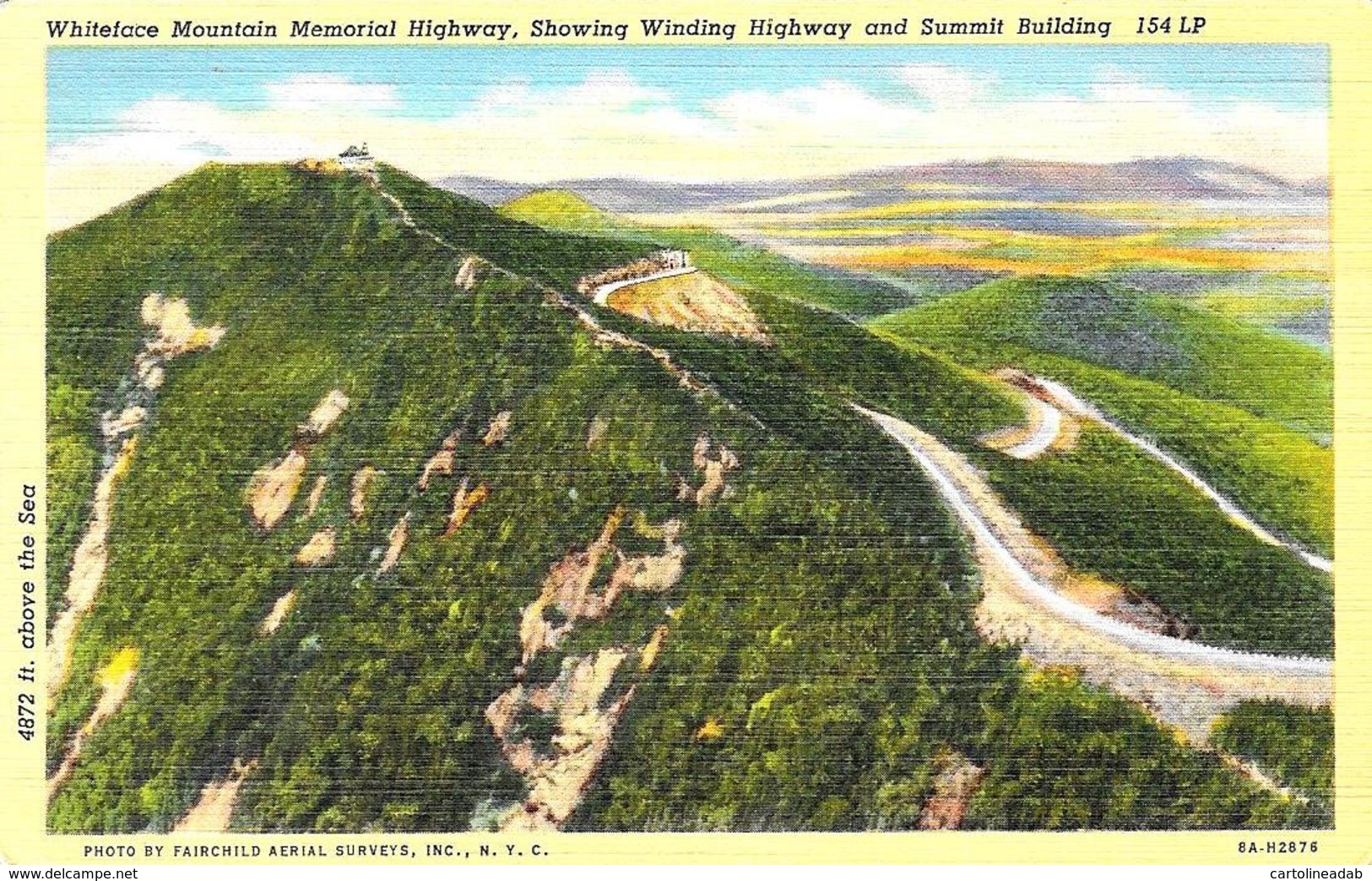 [DC12054] CPA - UNITED STATES - WHITEFACE MOUNTAIN MEMORIAL HIGHWAY SHOWING WINDING HIGHWAY AND SUMMIT BUILDING - NV - Adirondack