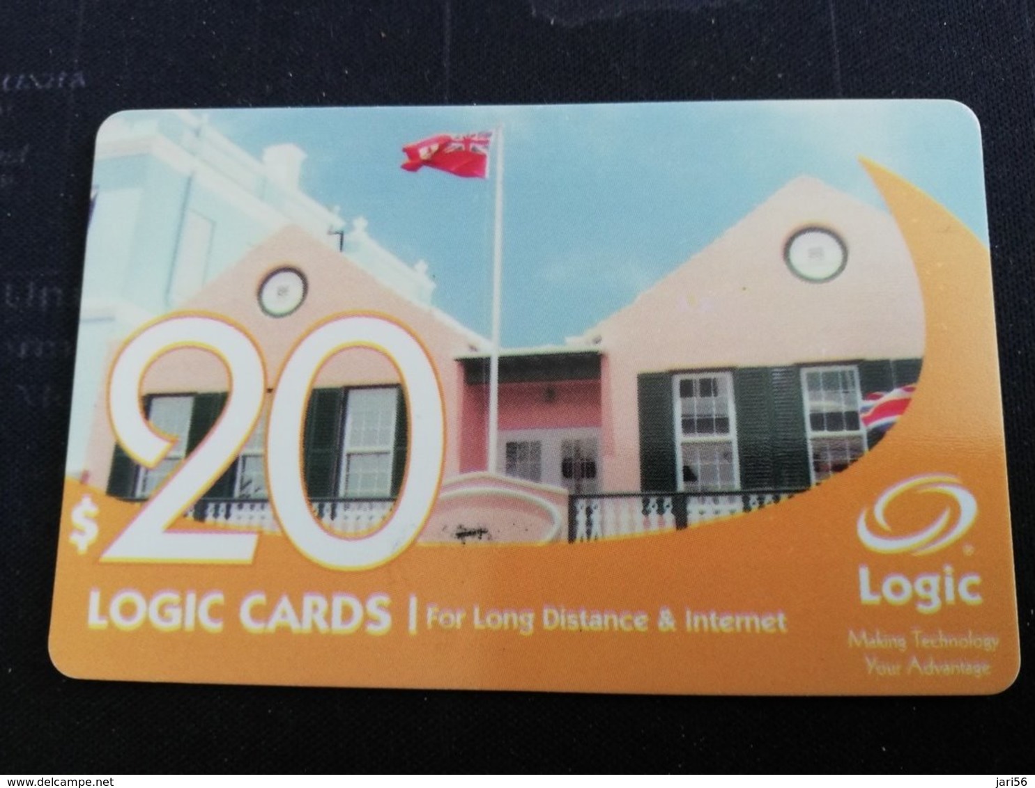 BERMUDA  $20  HOUSING AND FLAG   BERMUDA    PREPAID CARD  Fine USED New  Logo LOGIC **1234** - Bermudes