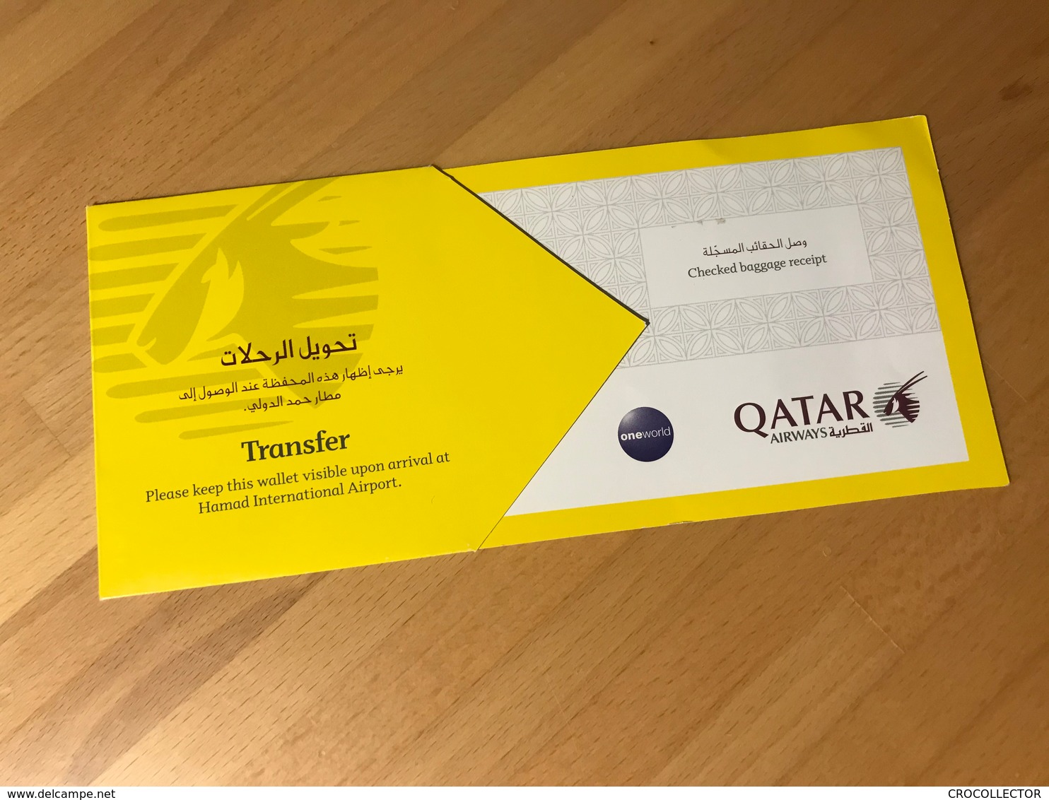 QATAR AIRWAYS ONE WORLD ECONOMY CLASS BOARDING PASS YELLOW JACKET AT HAMAD INTERNATIONAL AIRPORT DOHA - Stationery