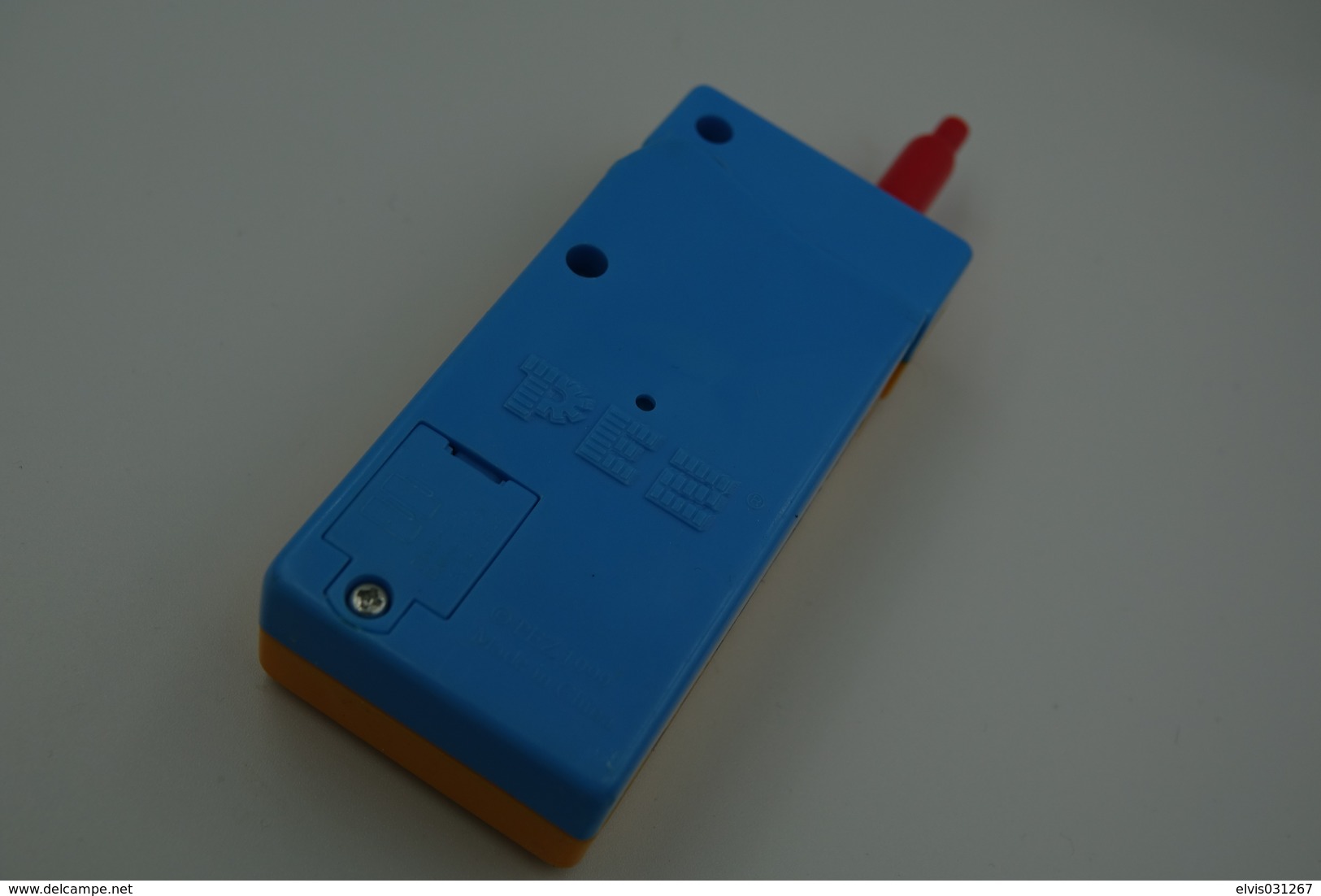 Vintage PEZ DISPENSER : ORANGE PHONE  - 1999 - Us Patent China Made L=12cm - Beeldjes