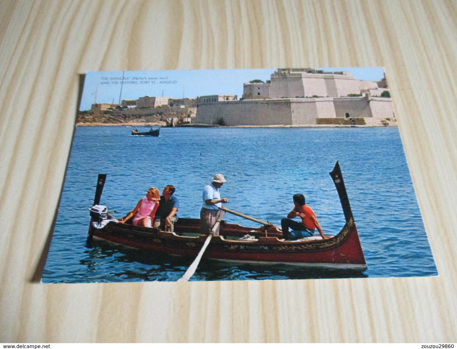Malta - The Dghajsa' (Malta's Water Taxi) And The Historic Fort St. Angelo. - Malta
