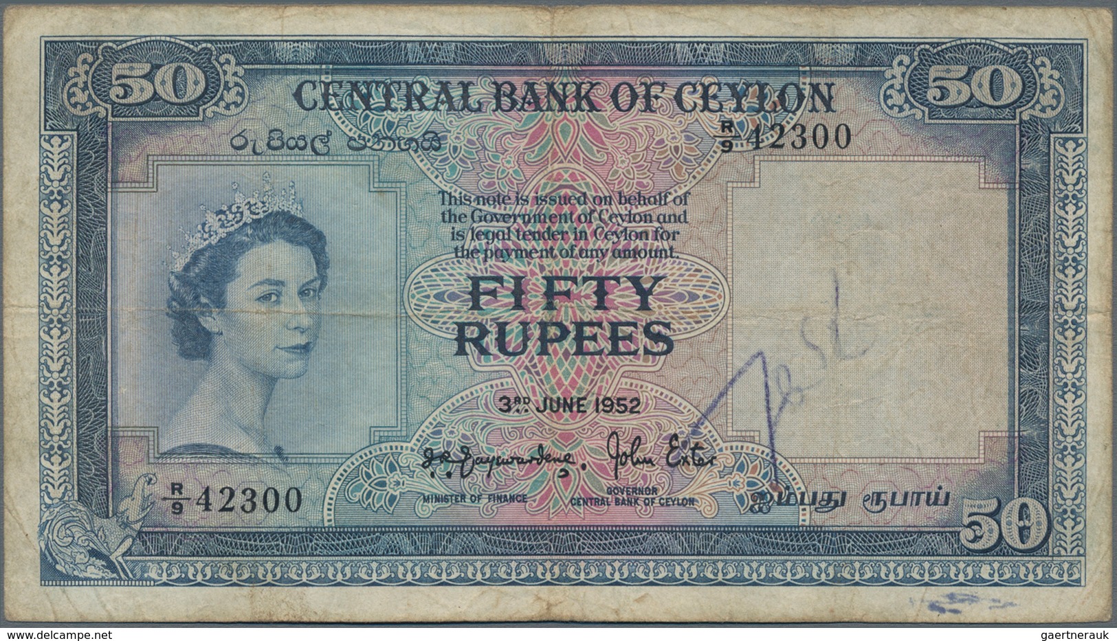 Ceylon: 50 Rupees 1952, P.52, Rare Banknote, Small Graffiti At Lower Center On Front And Lightly Ton - Sri Lanka