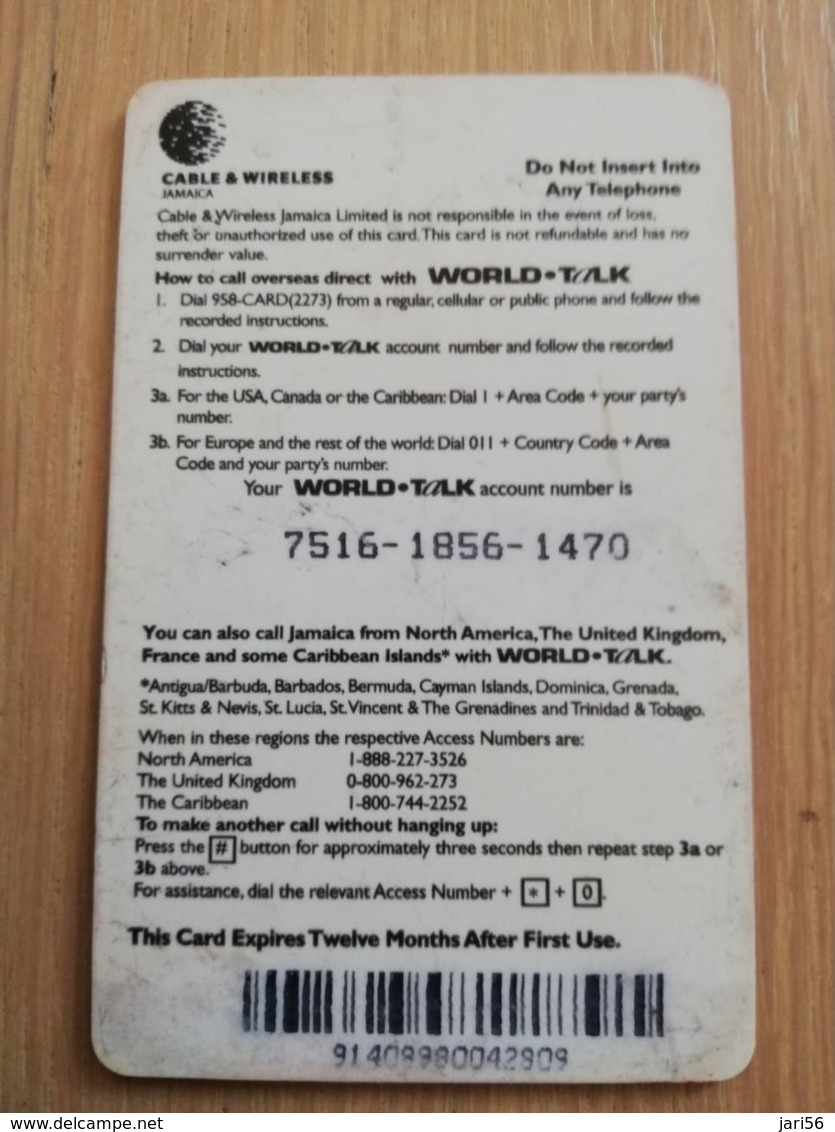 JAMAICA  J$100,-  PREPAID World -talk  THICK CARD Cable&wireless  P83  Fine Used Card  **2214** - Jamaica