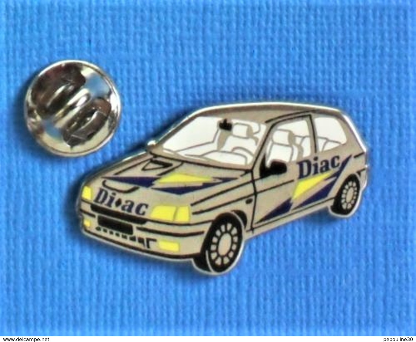 1 PIN'S //  ** RENAULT CLIO RS1 / TITANE DIAC ** . (Arthus Bertrand Paris) - Renault