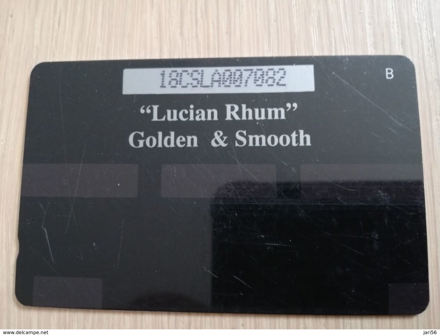 ST LUCIA    $ 10   CABLE & WIRELESS  STL-18AA  18CSLA    ST LUCIAN RHUM     Phine Used Card   ** 2474** - St. Lucia