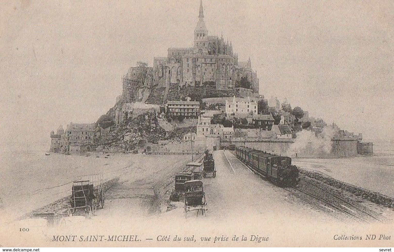 LE MONT SAINT-MICHEL. -  Côté Du Sud, Vue Prise De La Digue. Train Et Voitures-attelages 1er Plan - Le Mont Saint Michel