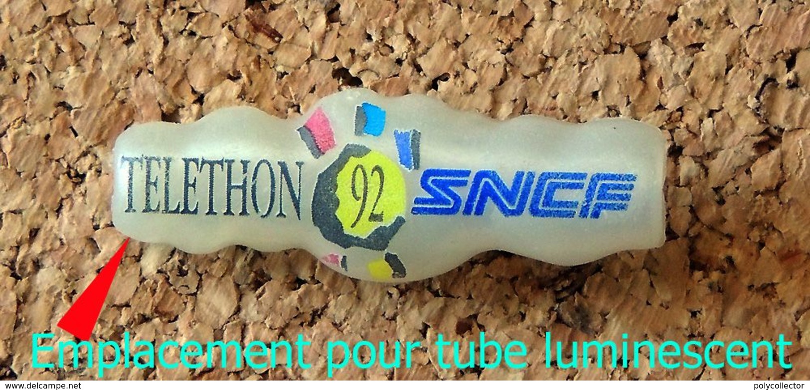 Pin's SNCF Train TELETHON 1992 SNCF Résine - Fabricant BY MADNESS - Pour Tube Luminescent * - TGV