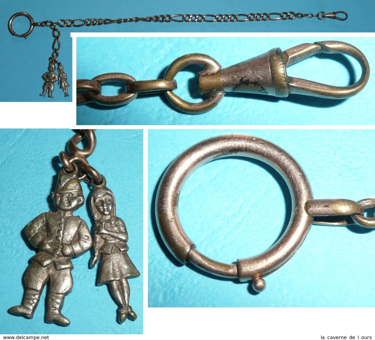 Rare Ancienne Chaine De Montre à Gousset En Laiton Plaqué Or, Avec 2 Personnages Roudoudou Militaire Et Delurette - Andere & Zonder Classificatie