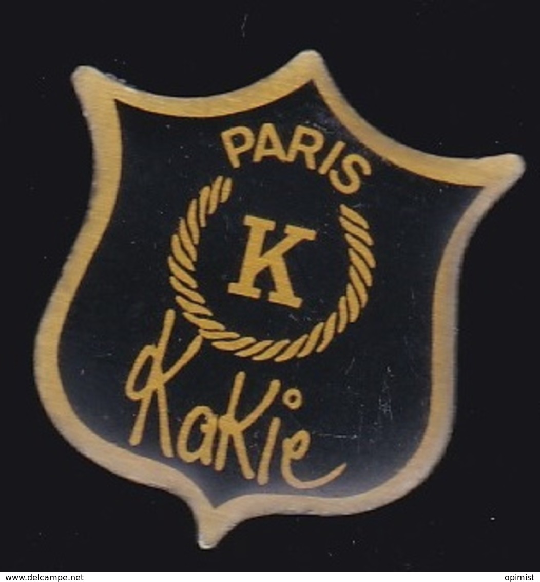65877-Pin's.marque Kakie.Paris. - Marcas Registradas