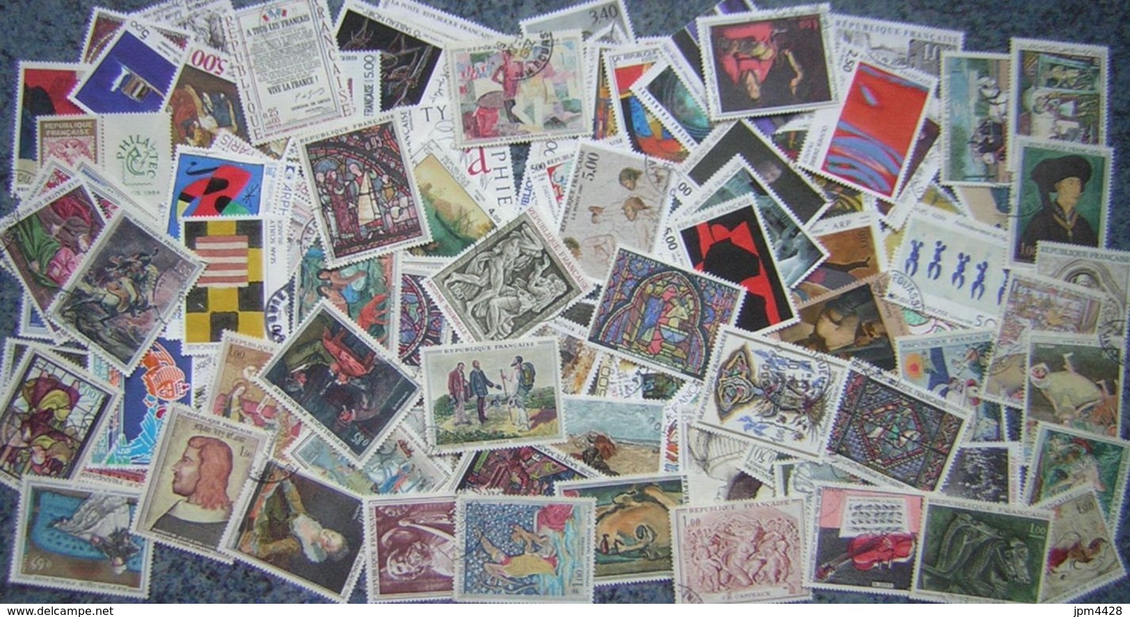 France Lot Vrac 1700 timbres oblitérés entre 1957 et 1994, majorité avec cachet rond, petits - grands formats différents
