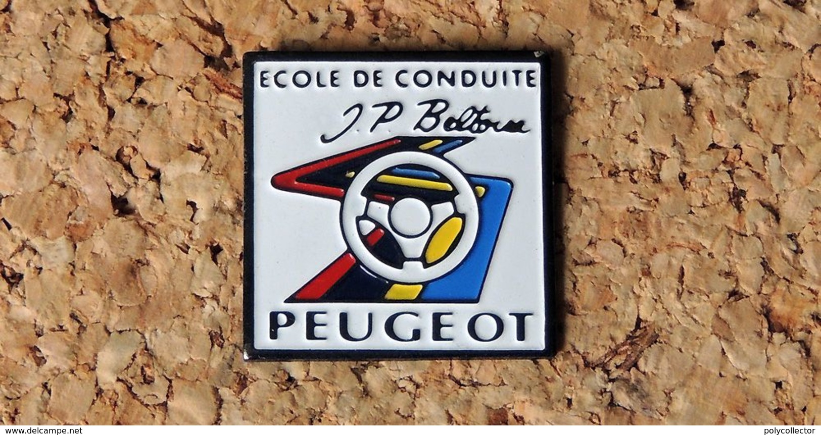 Pin's PEUGEOT Ecole De Conduite Jean Pierre BELTOISE - Peint Cloisonné - Fabricant STARPIN'S - Peugeot