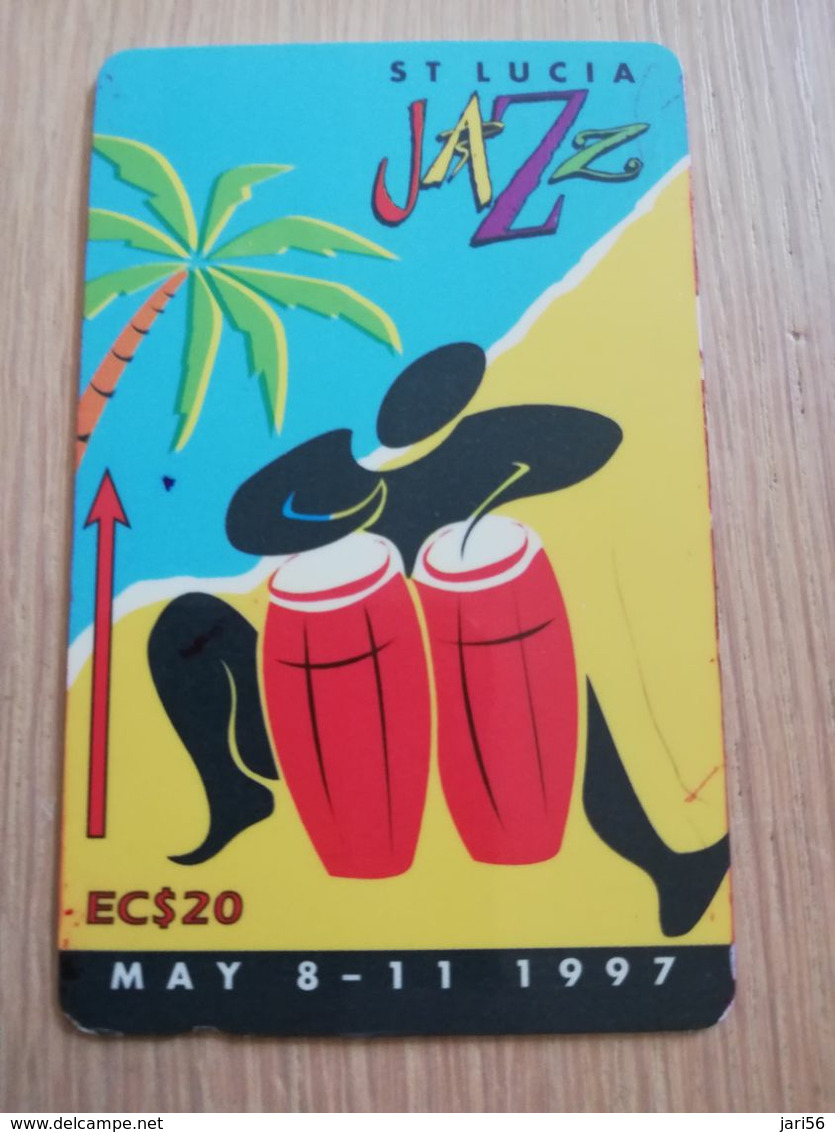 ST LUCIA    $ 20   CABLE & WIRELESS  STL-147E   147CSLE  JAZZ FESTIVAL 1997       Fine Used Card ** 2758** - Sainte Lucie