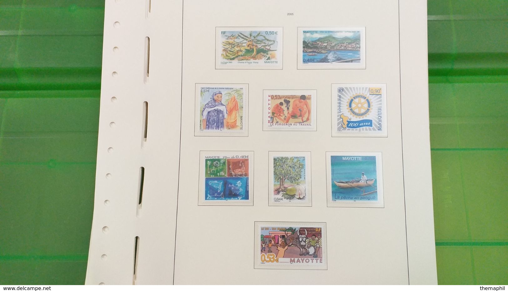 lot n° TH 492  MAYOTTE un lot de timbres neufs xx sur page d'albums