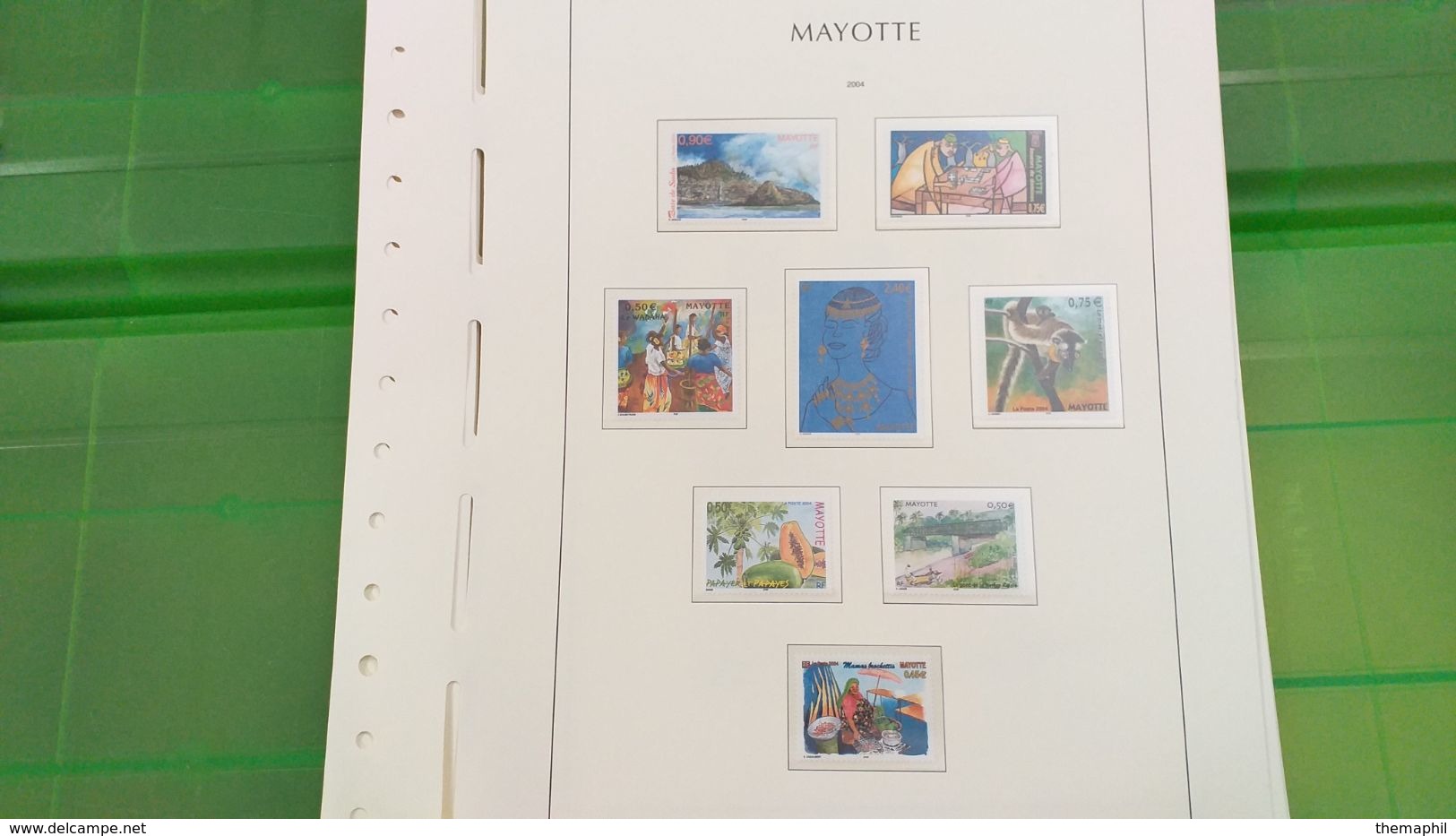 lot n° TH 492  MAYOTTE un lot de timbres neufs xx sur page d'albums