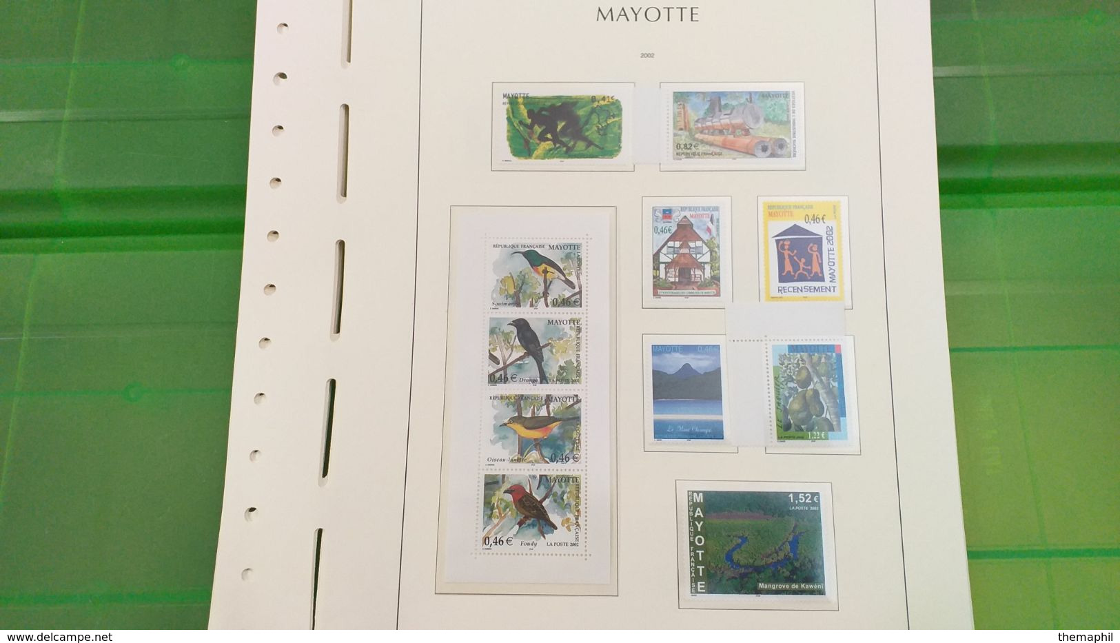 lot n° TH 492  MAYOTTE un lot de timbres neufs xx sur page d'albums