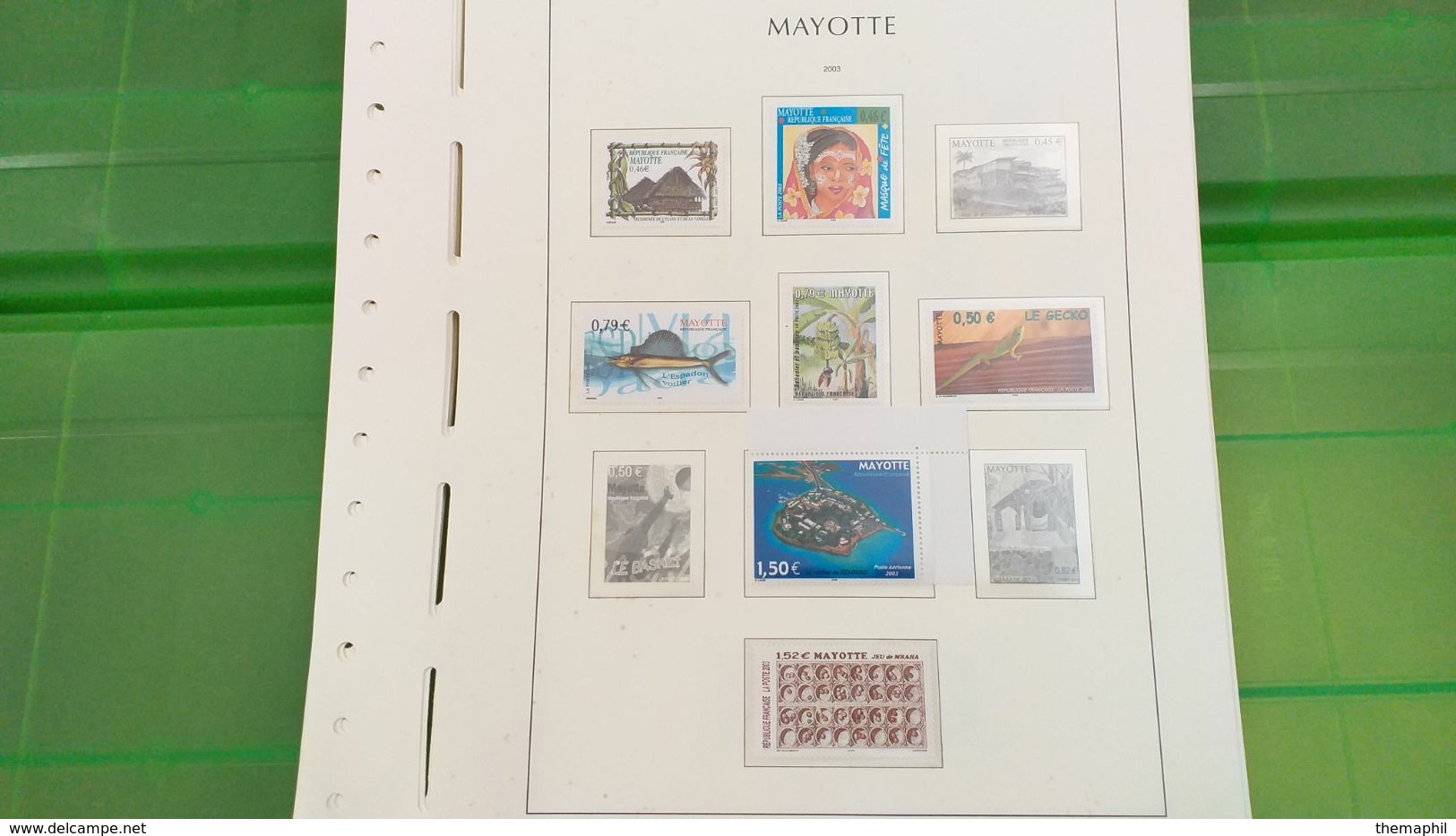 lot n° TH 492  MAYOTTE un lot de timbres neufs xx sur page d'albums