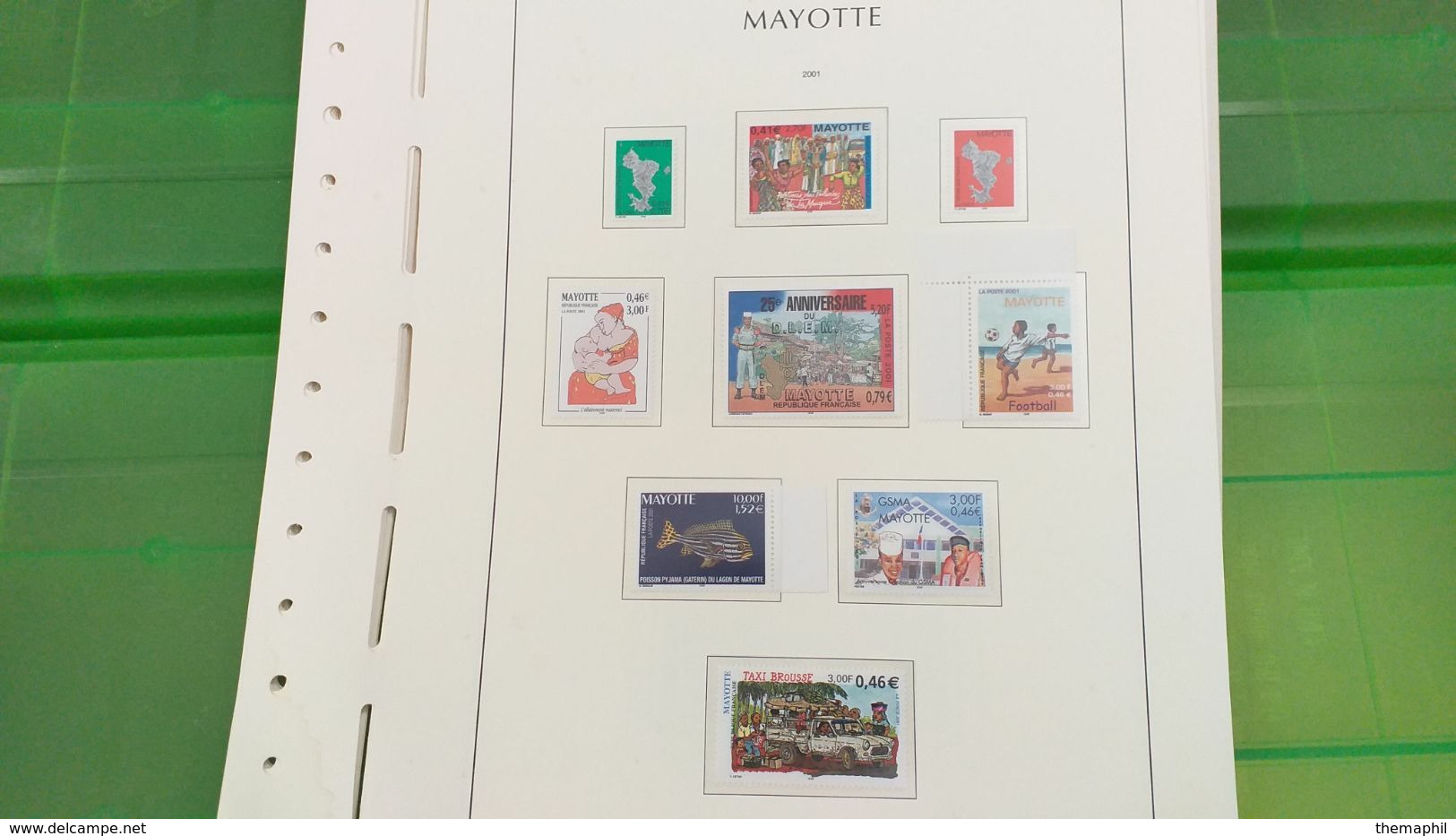 lot n° TH 492  MAYOTTE un lot de timbres neufs xx sur page d'albums