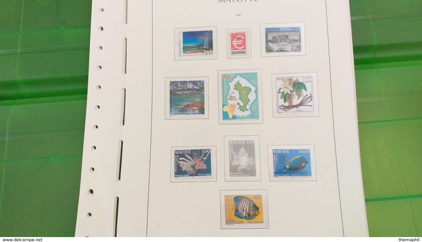 lot n° TH 492  MAYOTTE un lot de timbres neufs xx sur page d'albums