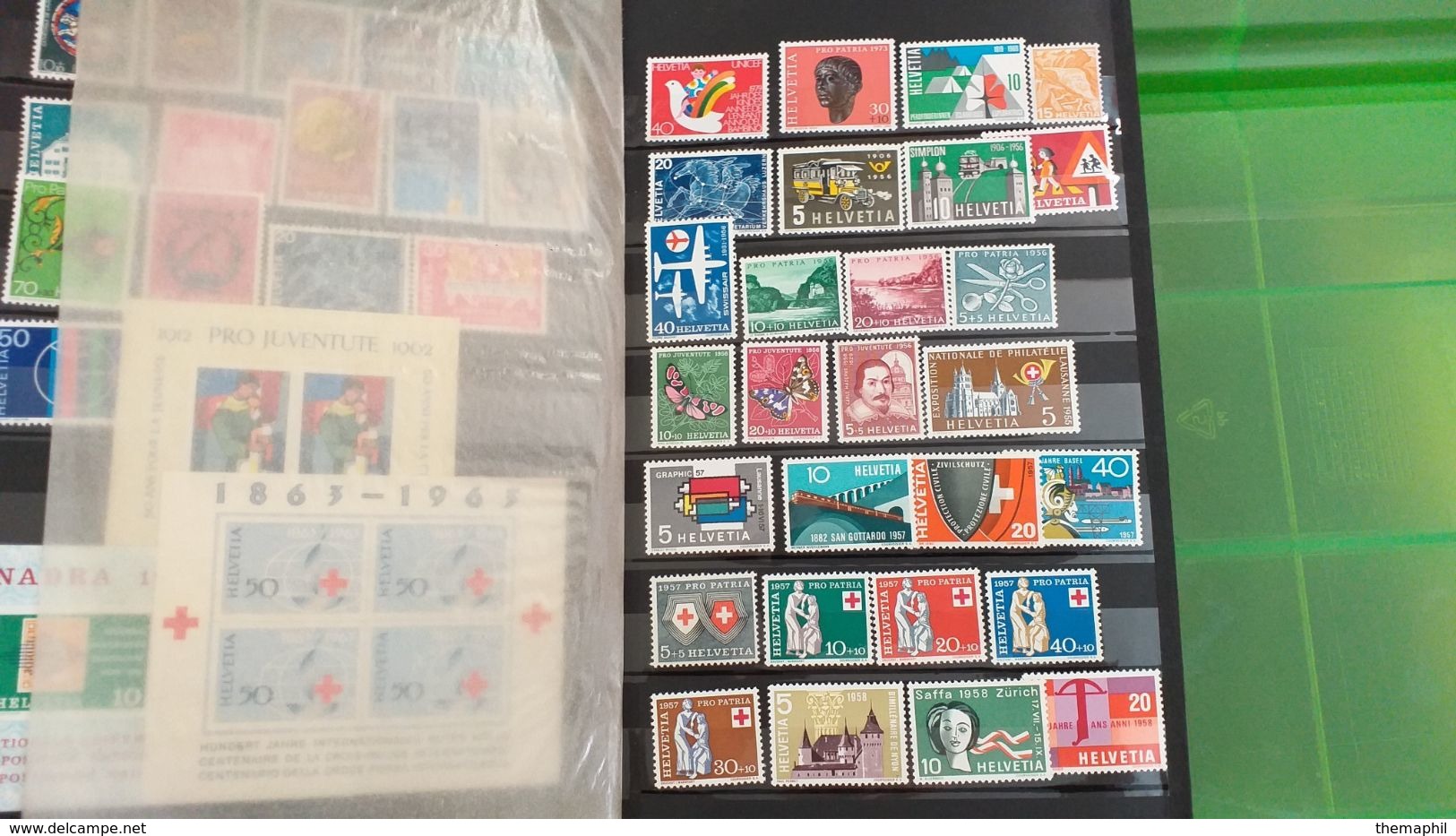 lot n° TH 483 SUISSE un bon classeur de timbres majoritée de  neufs xx