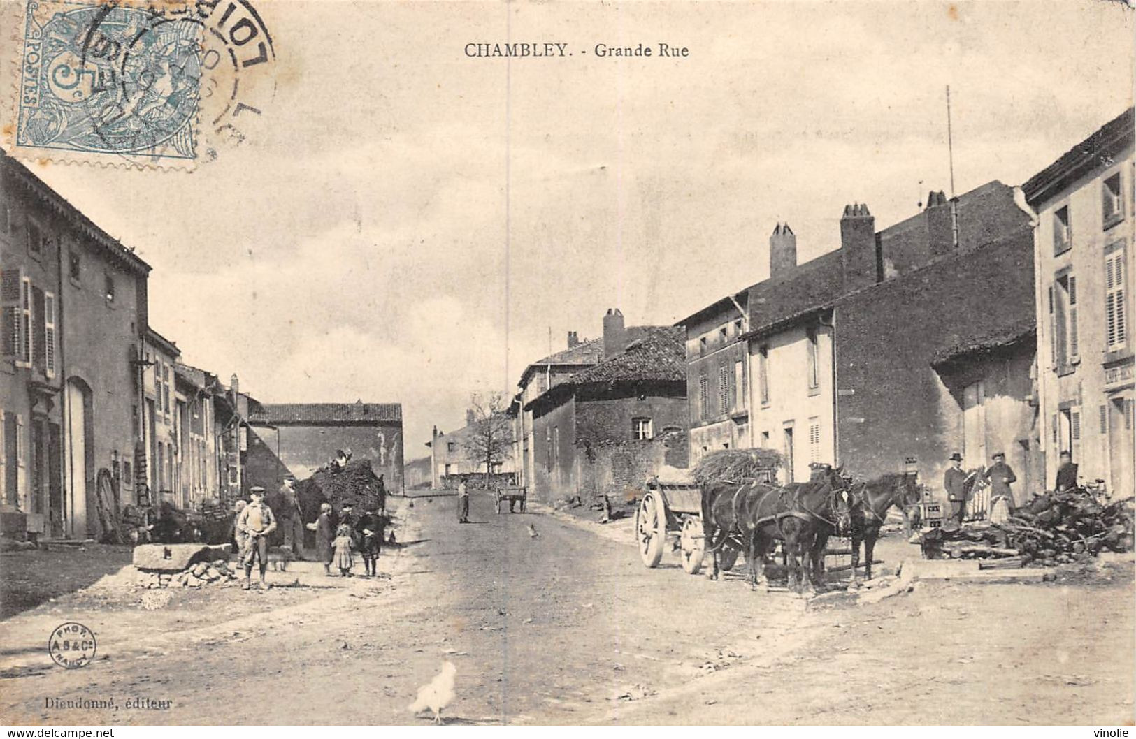 A-20-5228 : CHAMBLEY. GRANDE RUE . ATTELAGE CHARETTE CHEVAUX. CHEVAL - Chambley Bussieres