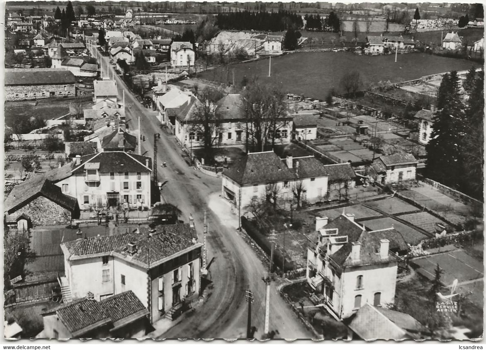 CPSM Jussac Les écoles Et Route Nationale - Jussac