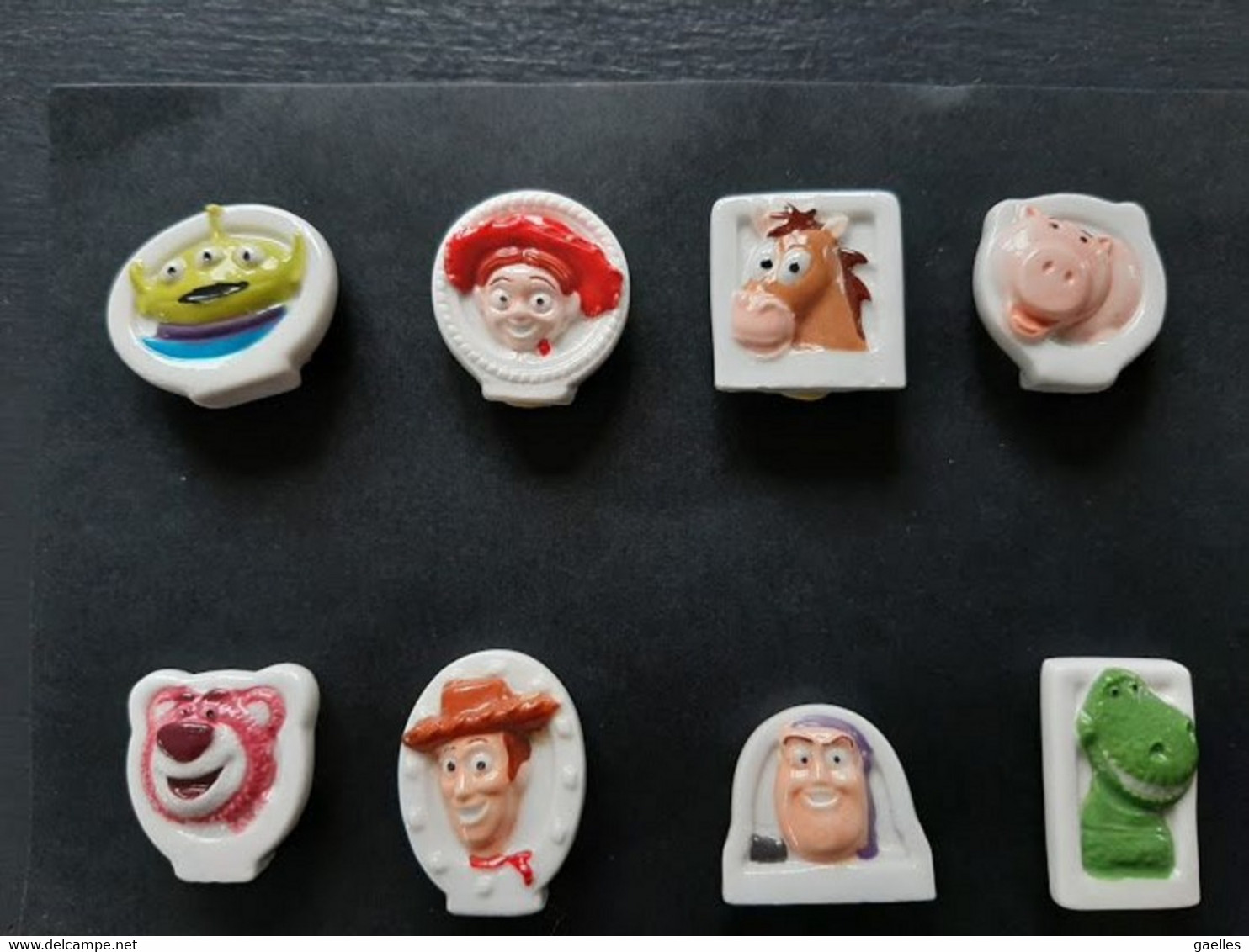 Série Complète De 8 Fèves Plates Brillantes DISNEY  "Toy Story III" 2011 - Disney
