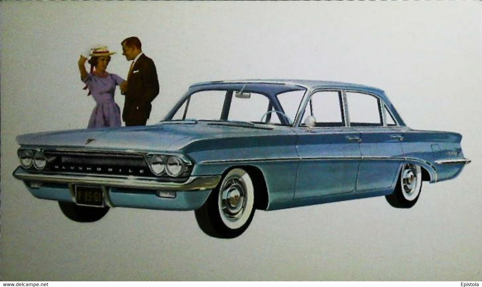 ► OLDSMOBILE F-85 De Luxe Sedan & Couple 1961 -  Garage Automobile Publicity (Litho. U.S.A.) Roadside - American Roadside