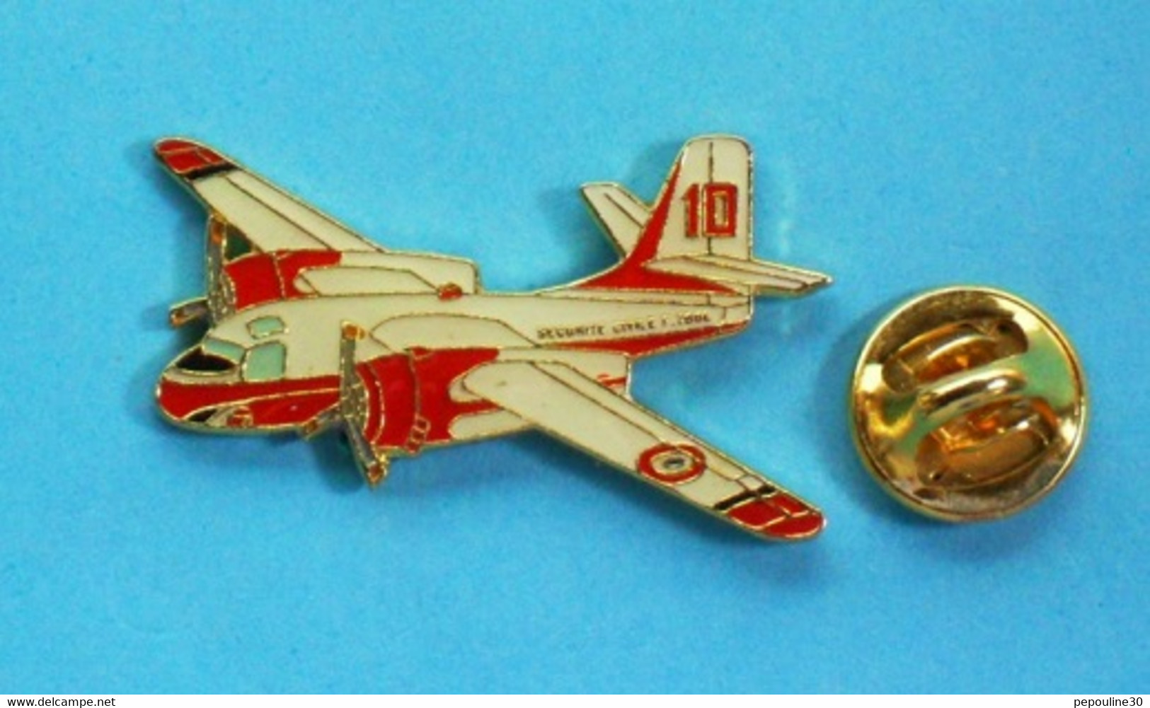 1 PIN'S  //   ** SÉCURITÉ CIVILE / AVION BOMBARDIER D'EAU / CANADAIR CL 415 CL 215 ** . (J.Y.Ségalen) - Avions