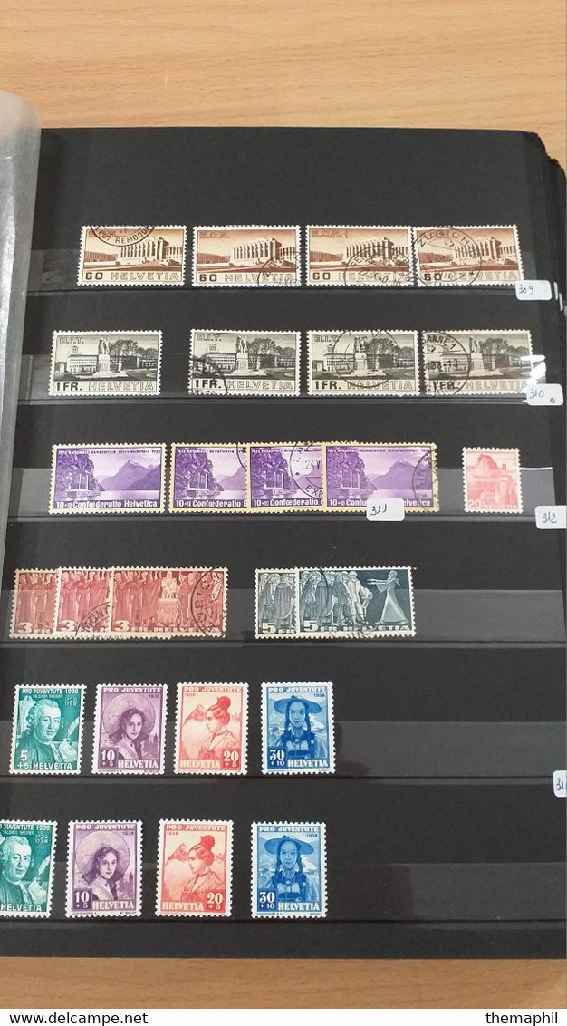 lot n° TH 1205 SUISSE importante collection dans un gros classeur nombreux neufs xx et obl.