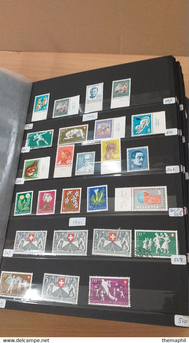 lot n° TH 1205 SUISSE importante collection dans un gros classeur nombreux neufs xx et obl.