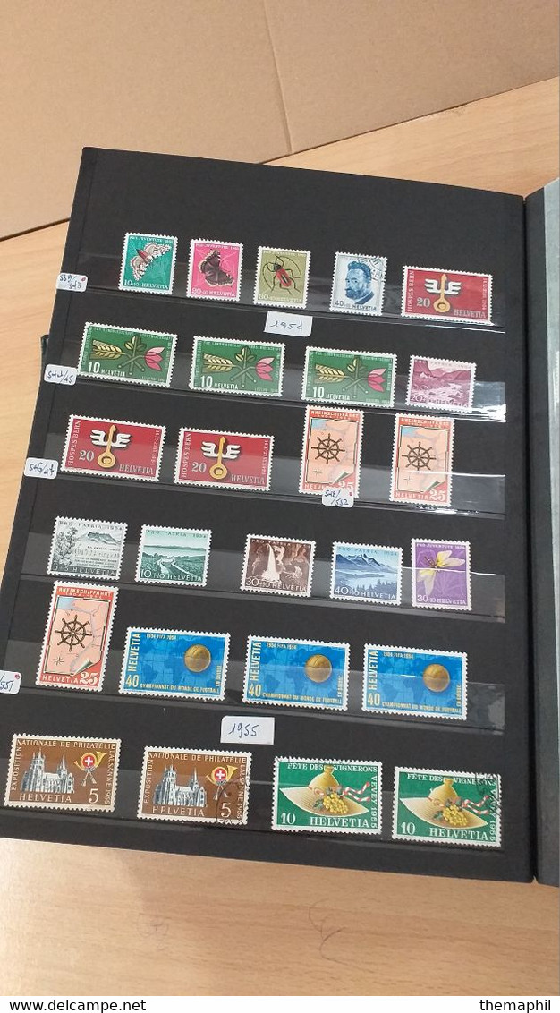 lot n° TH 1205 SUISSE importante collection dans un gros classeur nombreux neufs xx et obl.