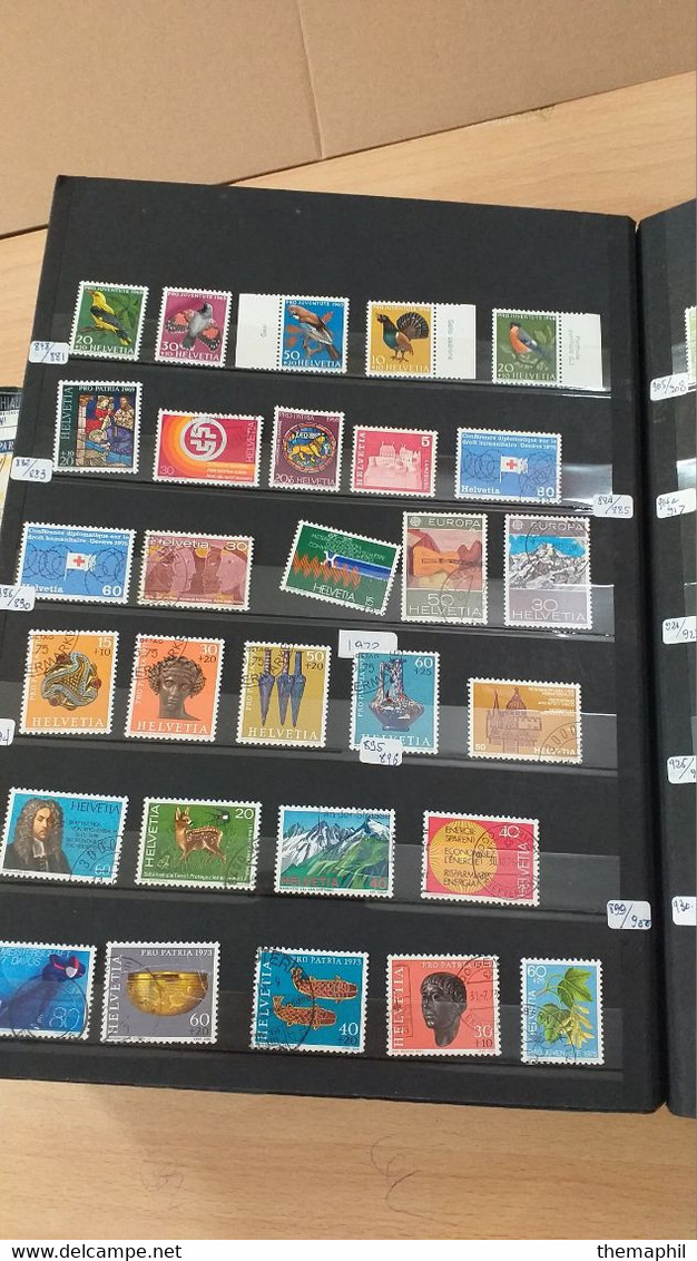 lot n° TH 1205 SUISSE importante collection dans un gros classeur nombreux neufs xx et obl.